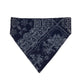 A navy blue bandana with a white paisley and floral pattern, folded into a triangle and displayed on a light background.