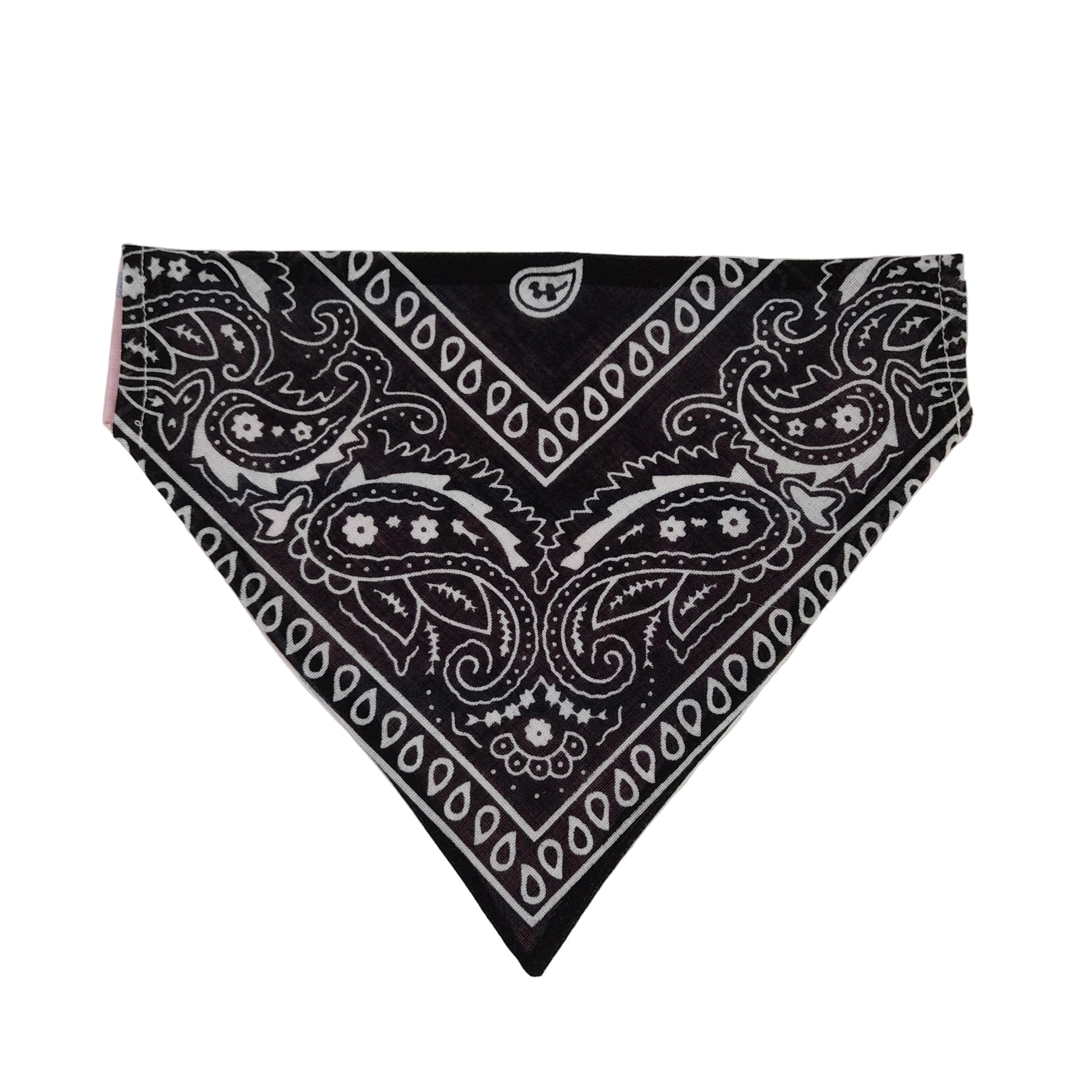 A black and white paisley bandana dog collar laid flat on a light background.