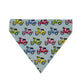A triangular bandana or scarf made of light blue fabric, printed with a repeating pattern of colorful cartoon scooters in pink, yellow, green, and blue, displayed flat against a neutral off-white background.