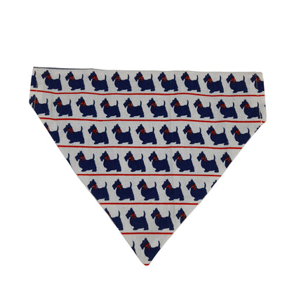 A triangular pet bandana with a repeating pattern of navy blue Scottish Terrier dogs and thin red horizontal stripes on a white background