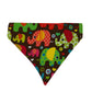 A triangular pet bandana featuring a colorful pattern of stylized elephants and small hearts and flowers on a dark brown background, shown flat against a white background.